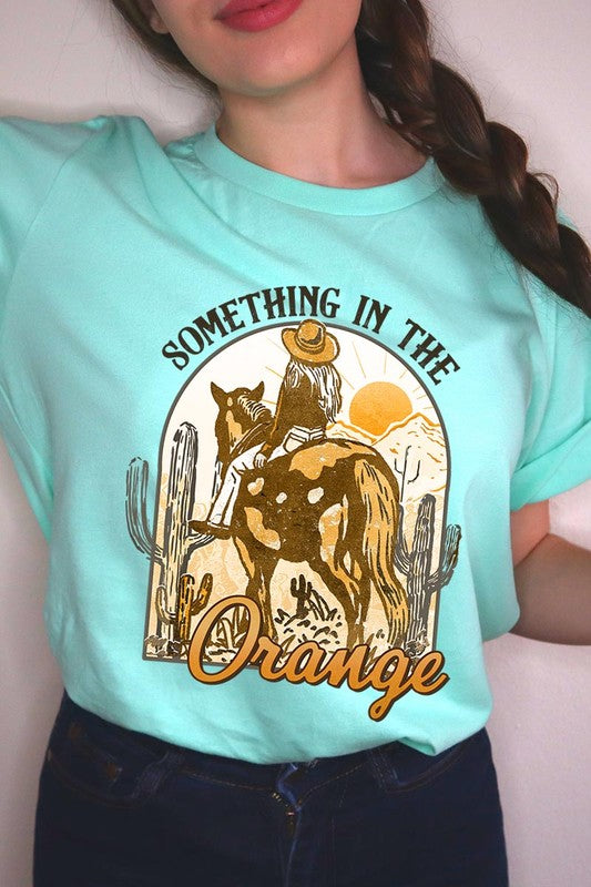 Something in the Orange Cowgirl Graphic Tee