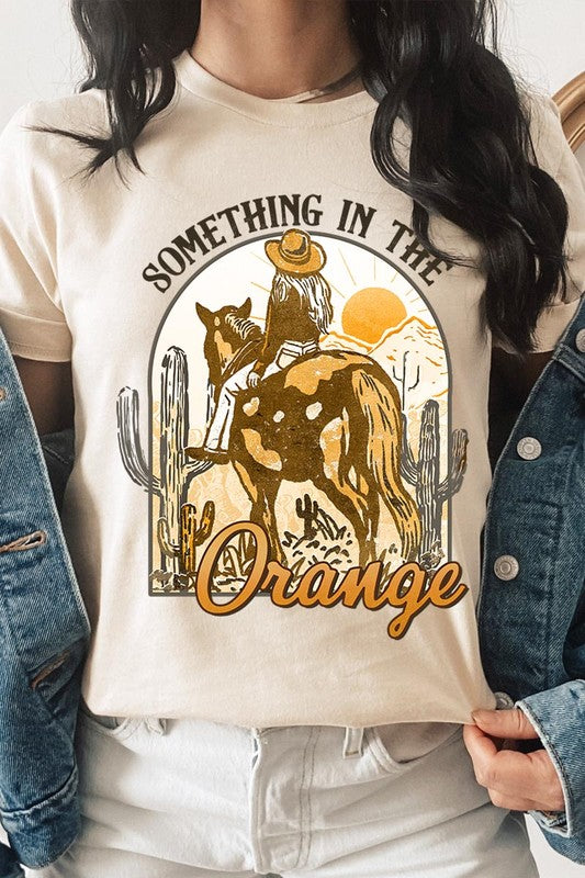 Something in the Orange Cowgirl Graphic Tee