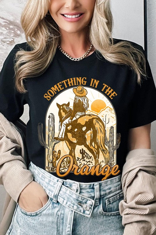 Something in the Orange Cowgirl Graphic Tee