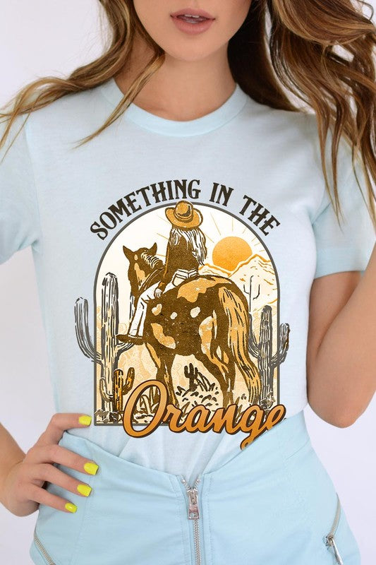 Something in the Orange Cowgirl Graphic Tee