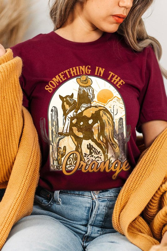 Something in the Orange Cowgirl Graphic Tee